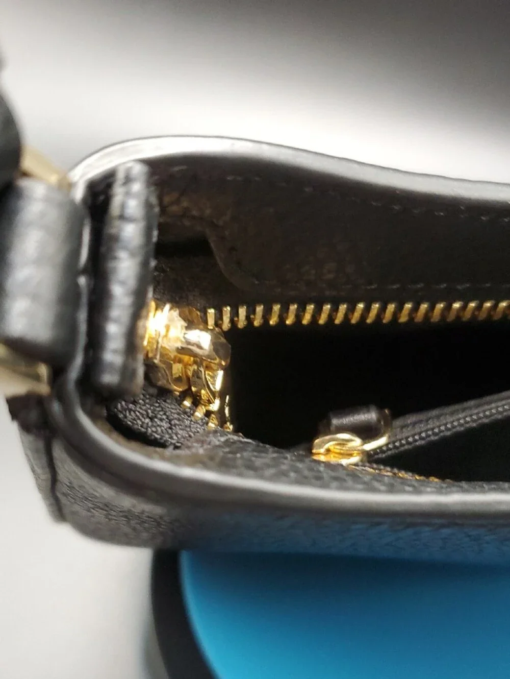 Kate Spade black pebbled leather shoulder bag with gold logo